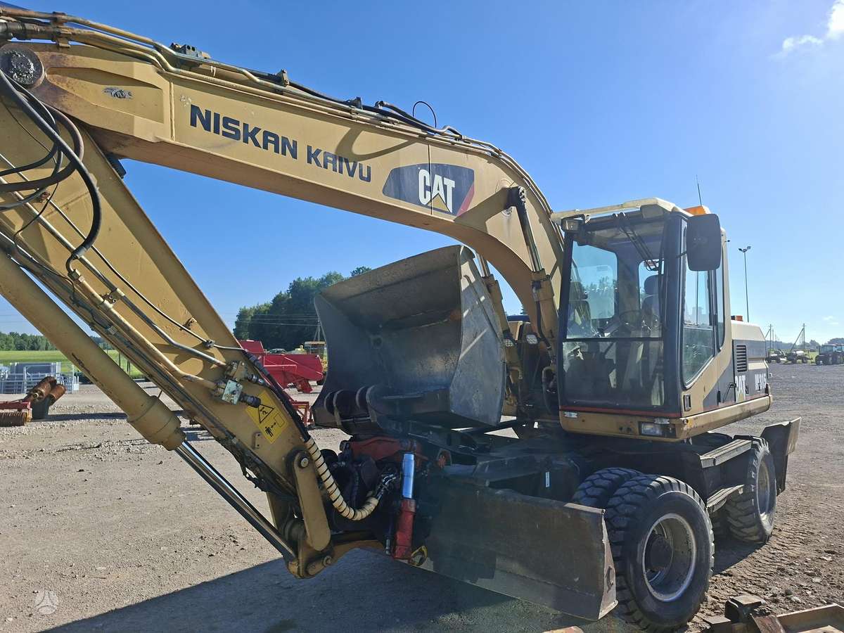 Caterpillar M315, экскаваторы