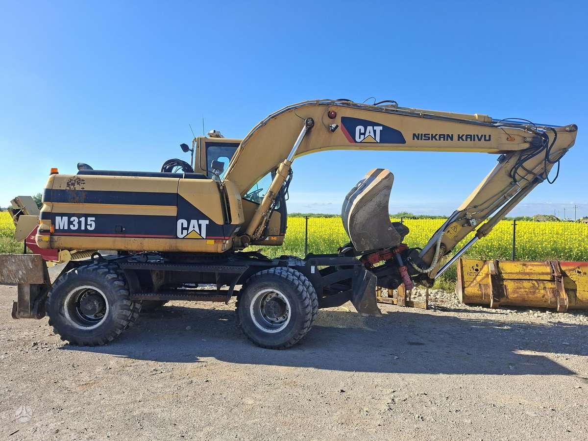 Caterpillar M315, экскаваторы