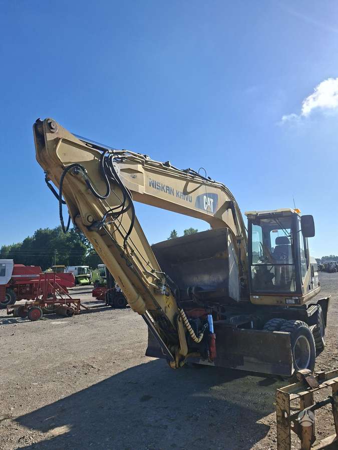 Caterpillar M315, экскаваторы