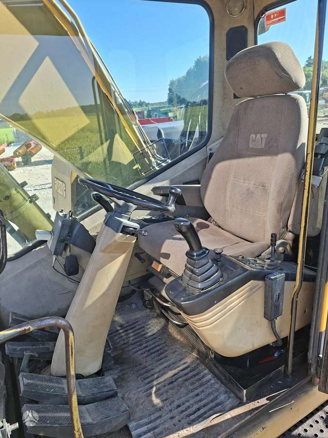 Caterpillar M315, экскаваторы