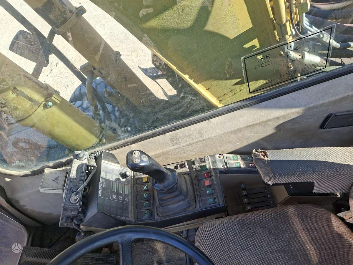 Caterpillar M315, экскаваторы