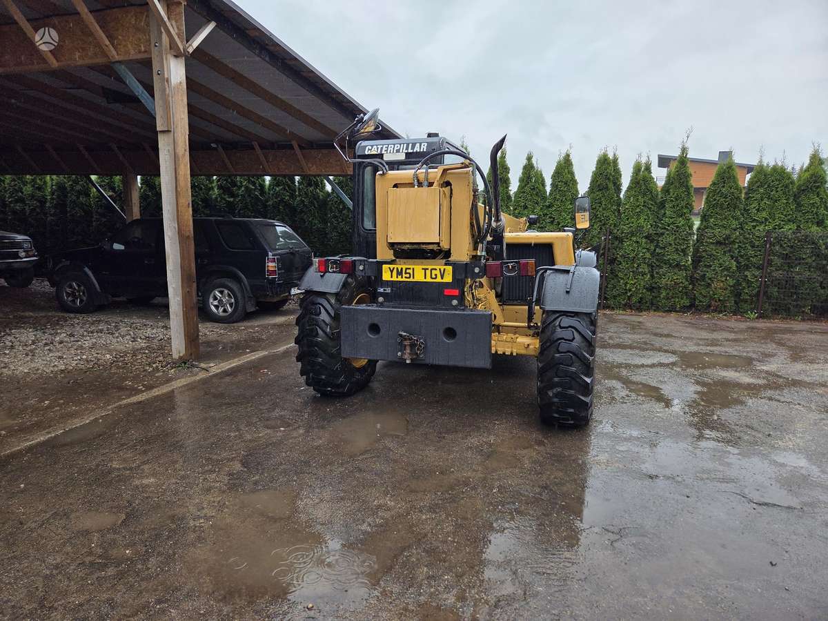 Caterpillar TH63, telescopic handler