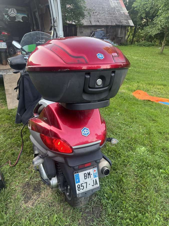 Piaggio MP3, трициклы