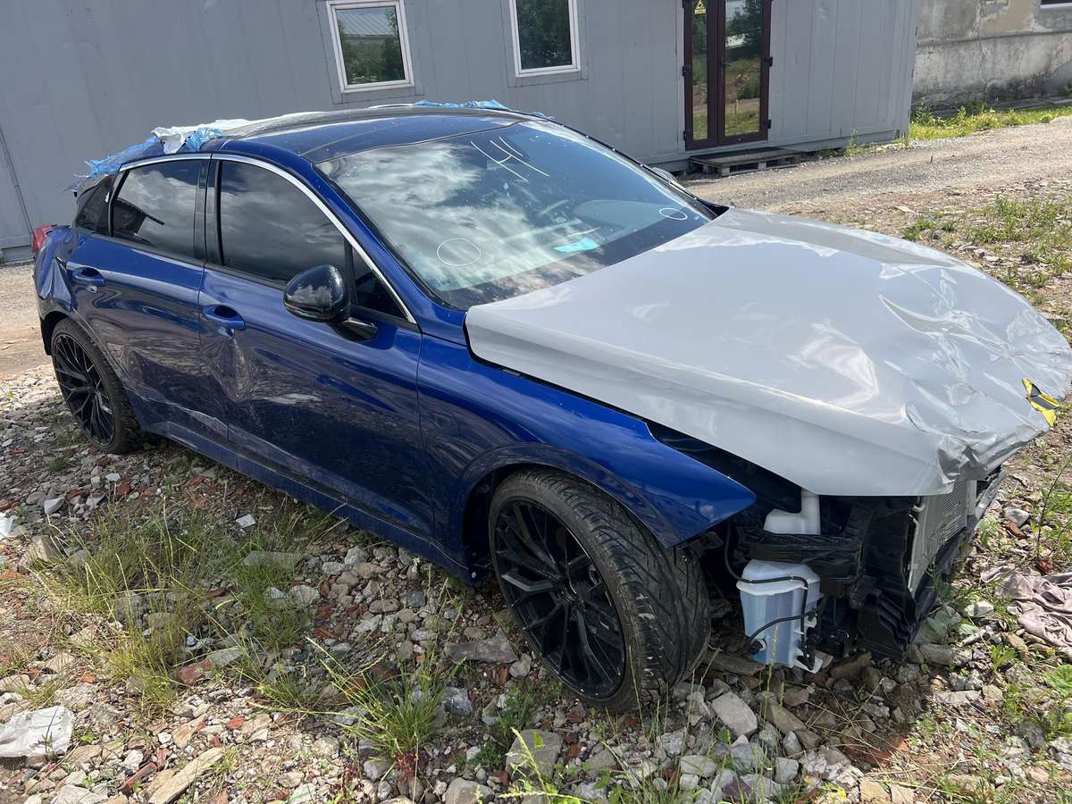 Kia K5 dalimis. Amerika