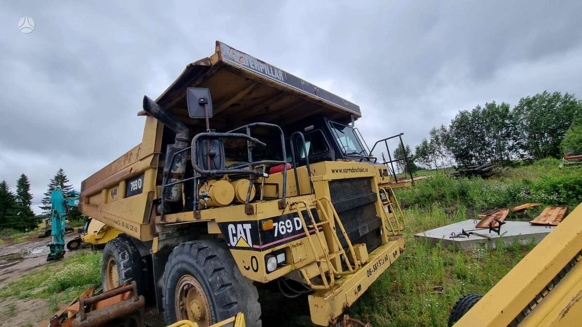 Caterpillar 769D, самосвалы