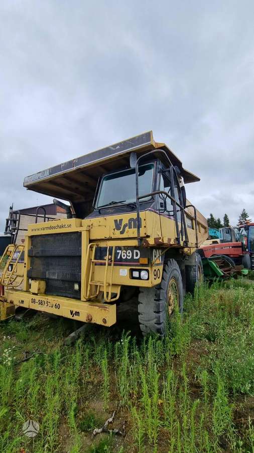Caterpillar 769D, самосвалы