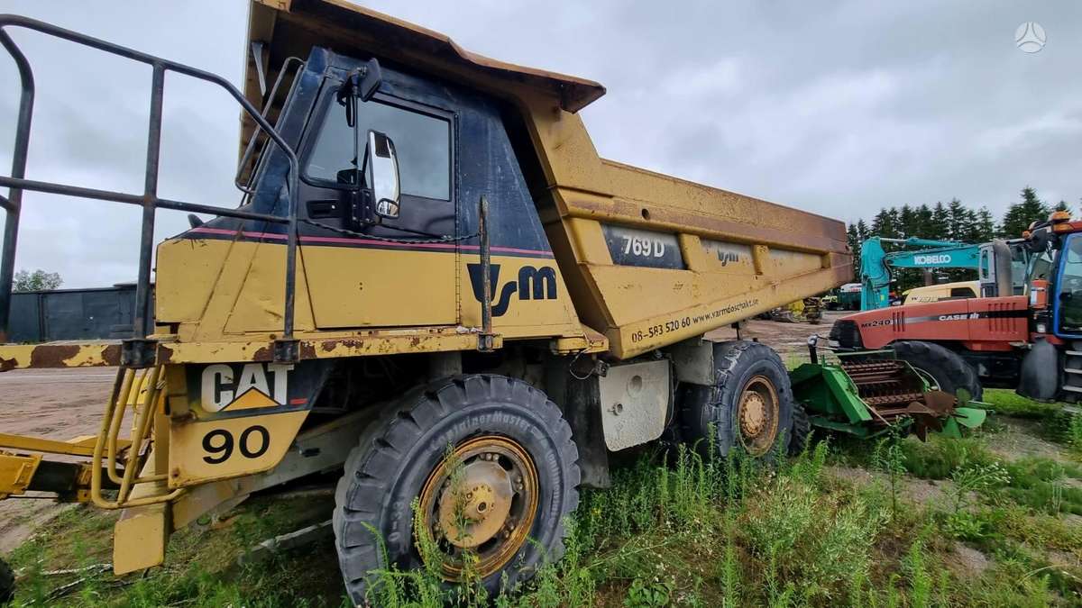 Caterpillar 769D, самосвалы