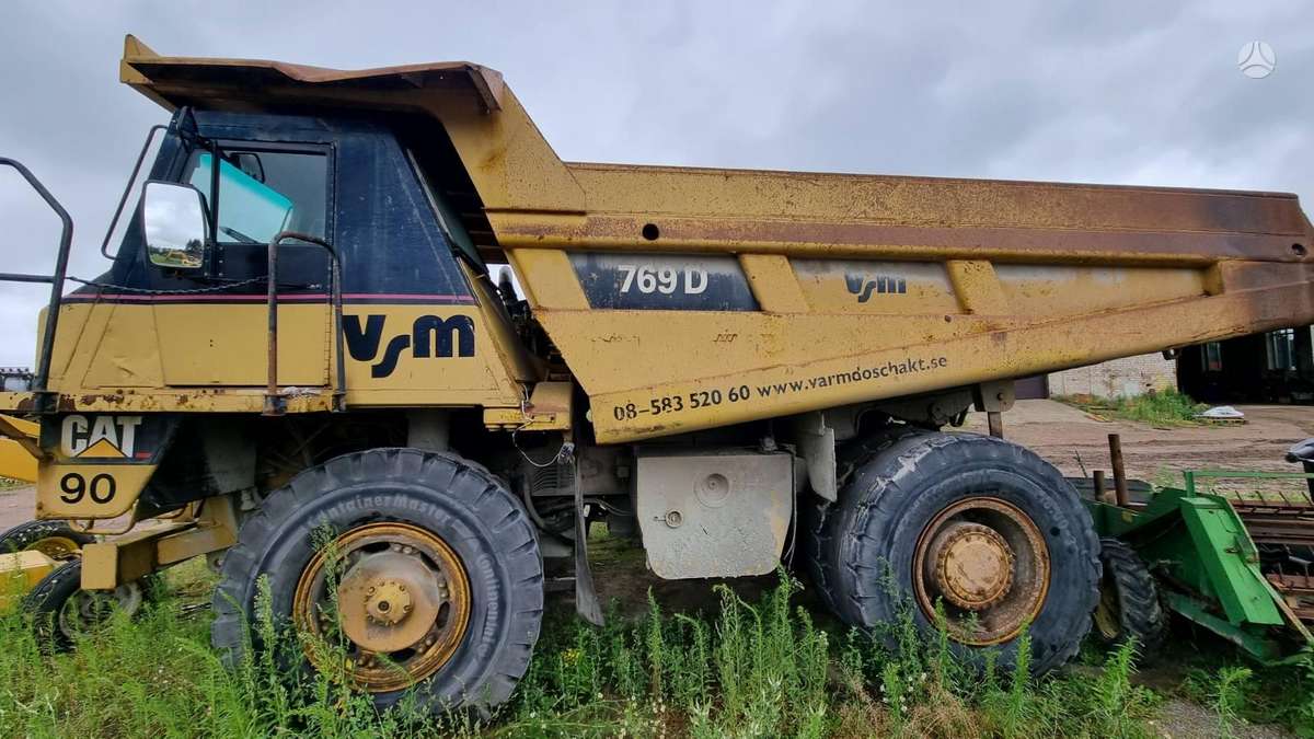 Caterpillar 769D, самосвалы