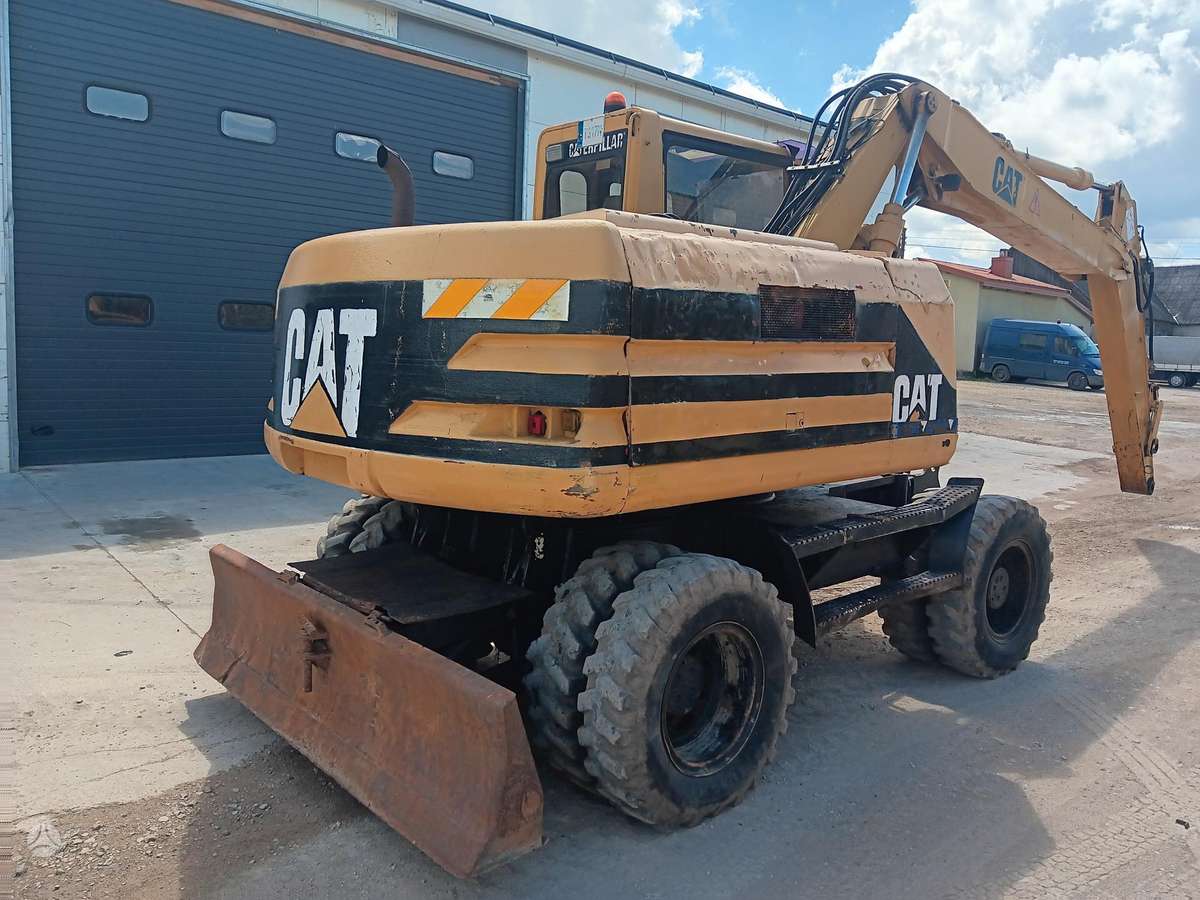 Caterpillar M315, экскаваторы