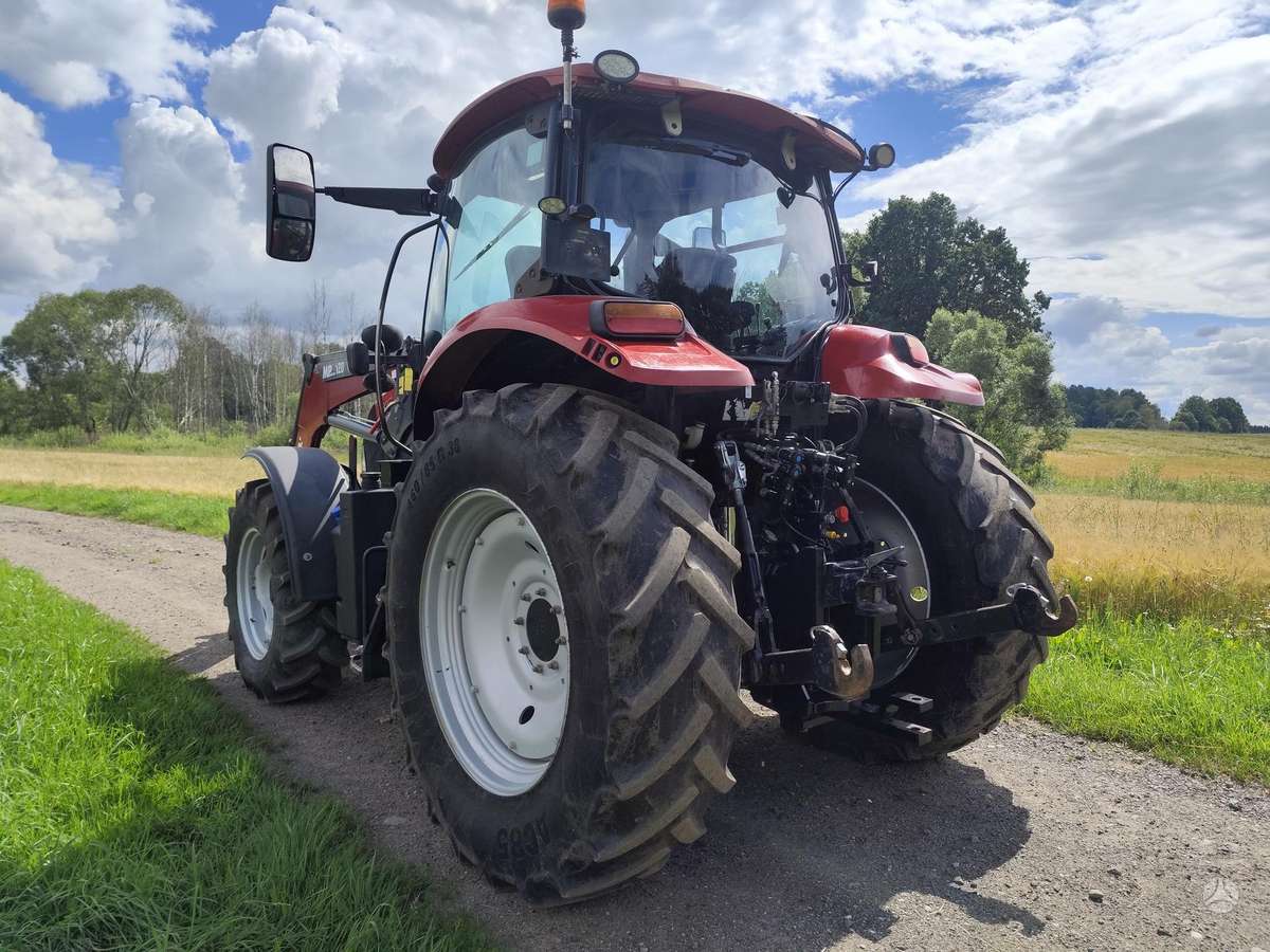 Case-IH Maxxum su krautuvu, tractors