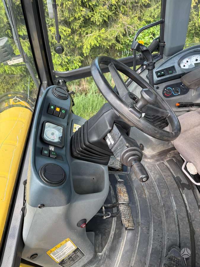 New Holland LB110B-4PT, excavator loader