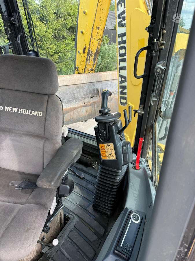 New Holland LB110B-4PT, excavator loader