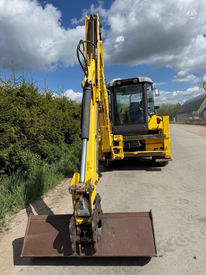 New Holland LB110B-4PT, excavator loader