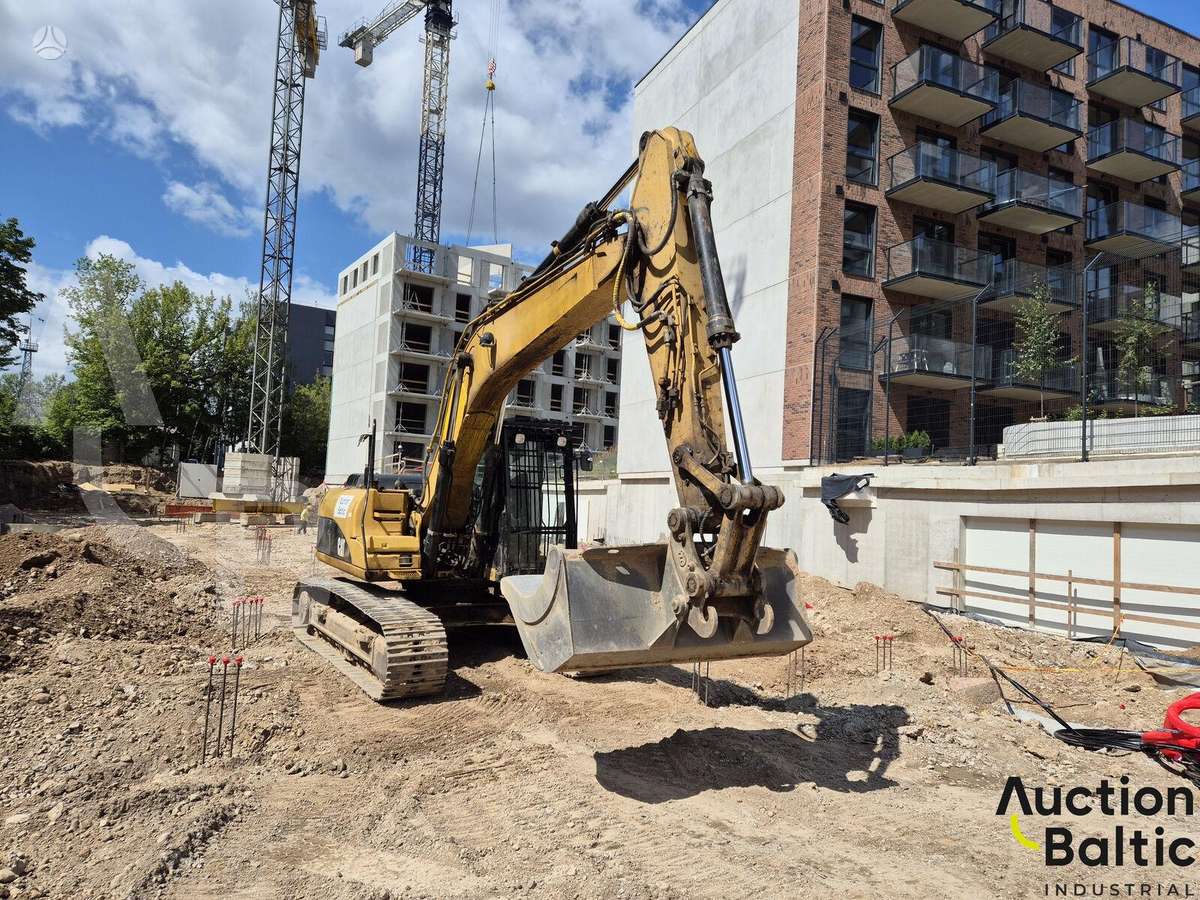 Caterpillar 319 D, экскаваторы