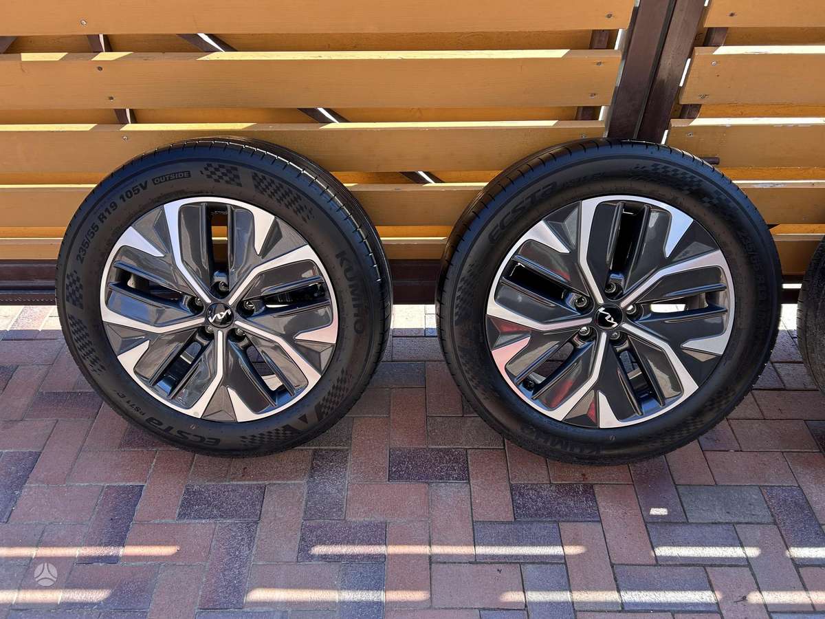 Kia Optima dalimis. 1 štorkė
