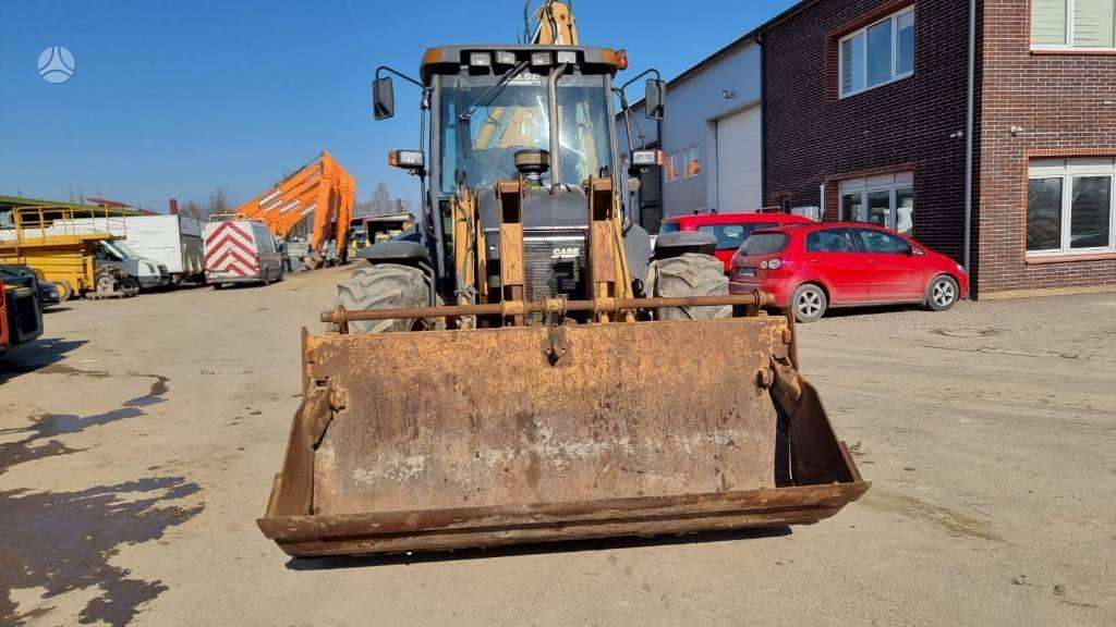 Case 695 SR2-4PS, экскаваторные погрузчики