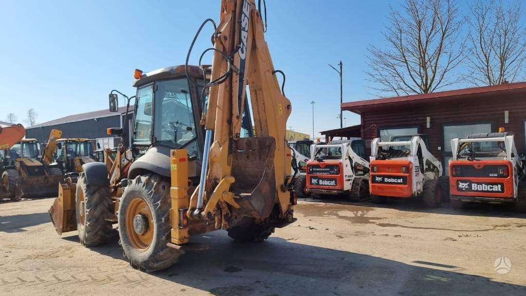 Case 695 SR2-4PS, excavator loader