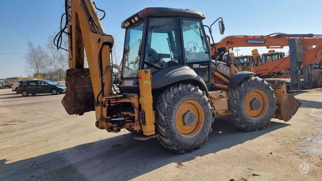 Case 695 SR2-4PS, экскаваторные погрузчики