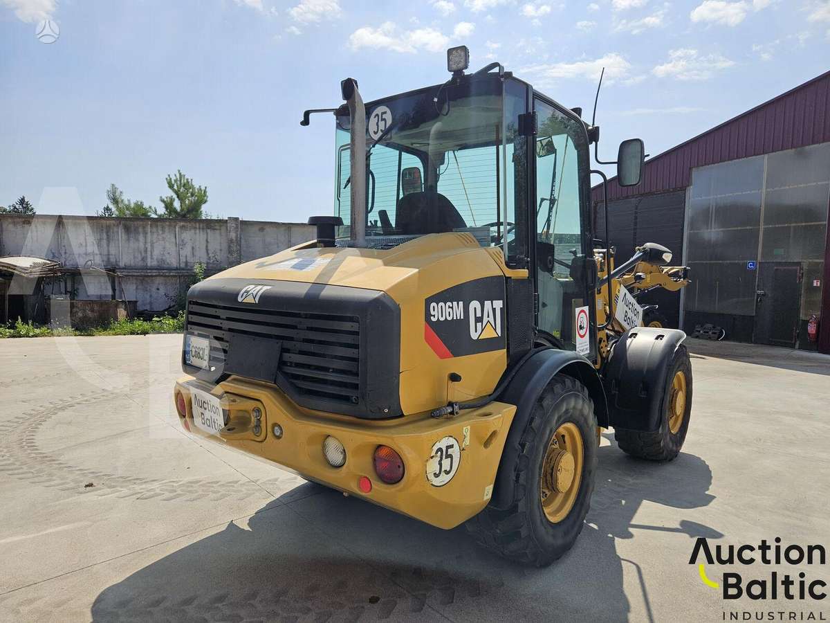Caterpillar 906 M, фронтальные погрузчики