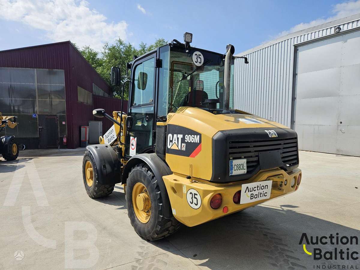 Caterpillar 906 M, фронтальные погрузчики