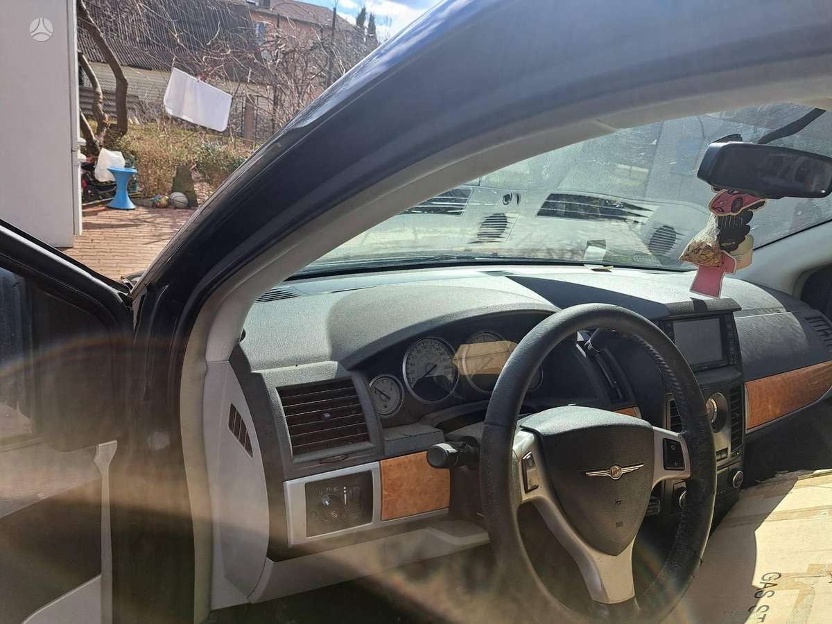 Chrysler Grand Voyager dalimis