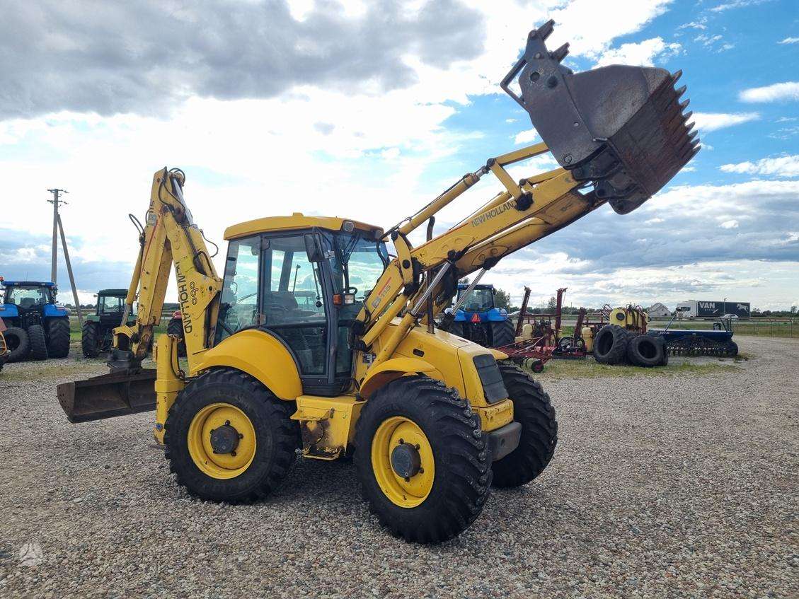 New Holland LB115, excavator loader