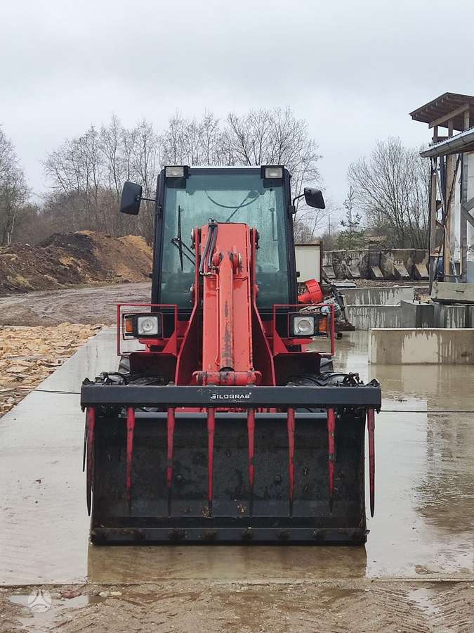 Schaffer 550t, экскаваторные погрузчики