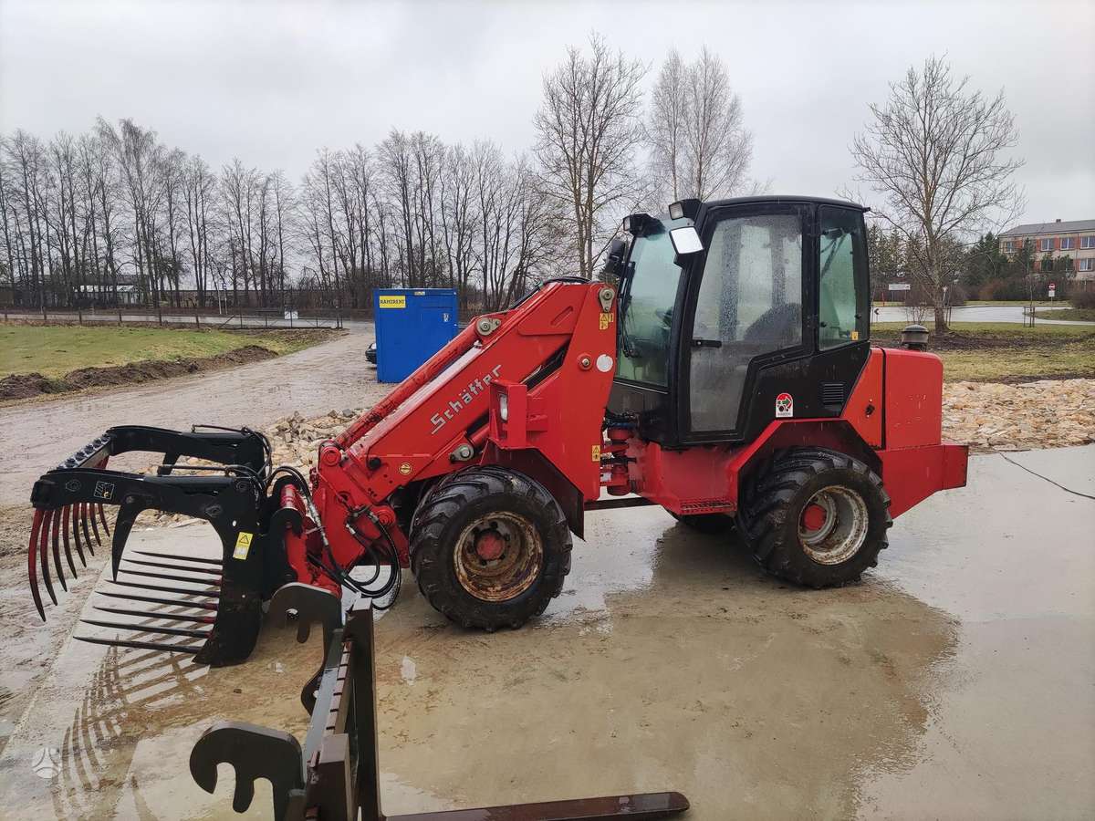 Schaffer 550t, экскаваторные погрузчики
