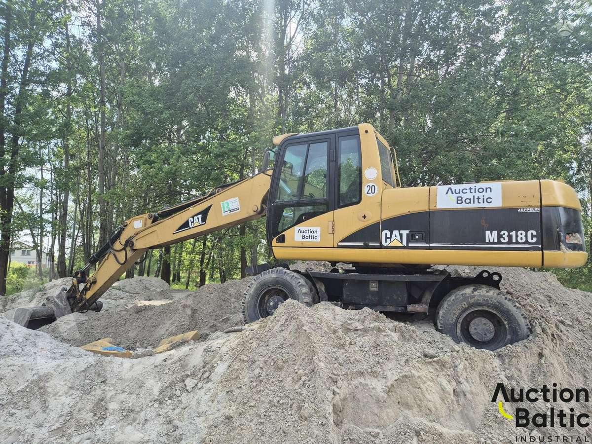 Caterpillar M 318 C, экскаваторы