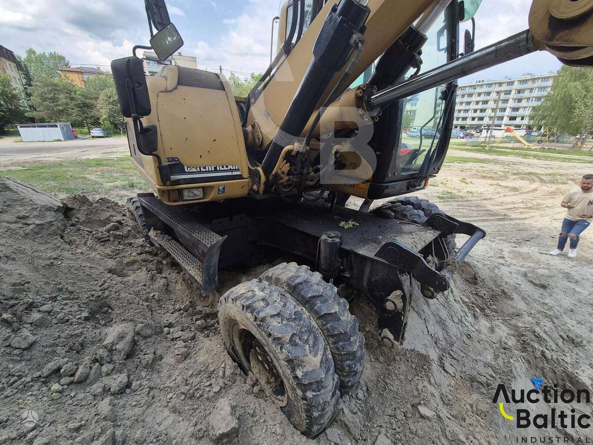 Caterpillar M 318 C, ekskavatoriai