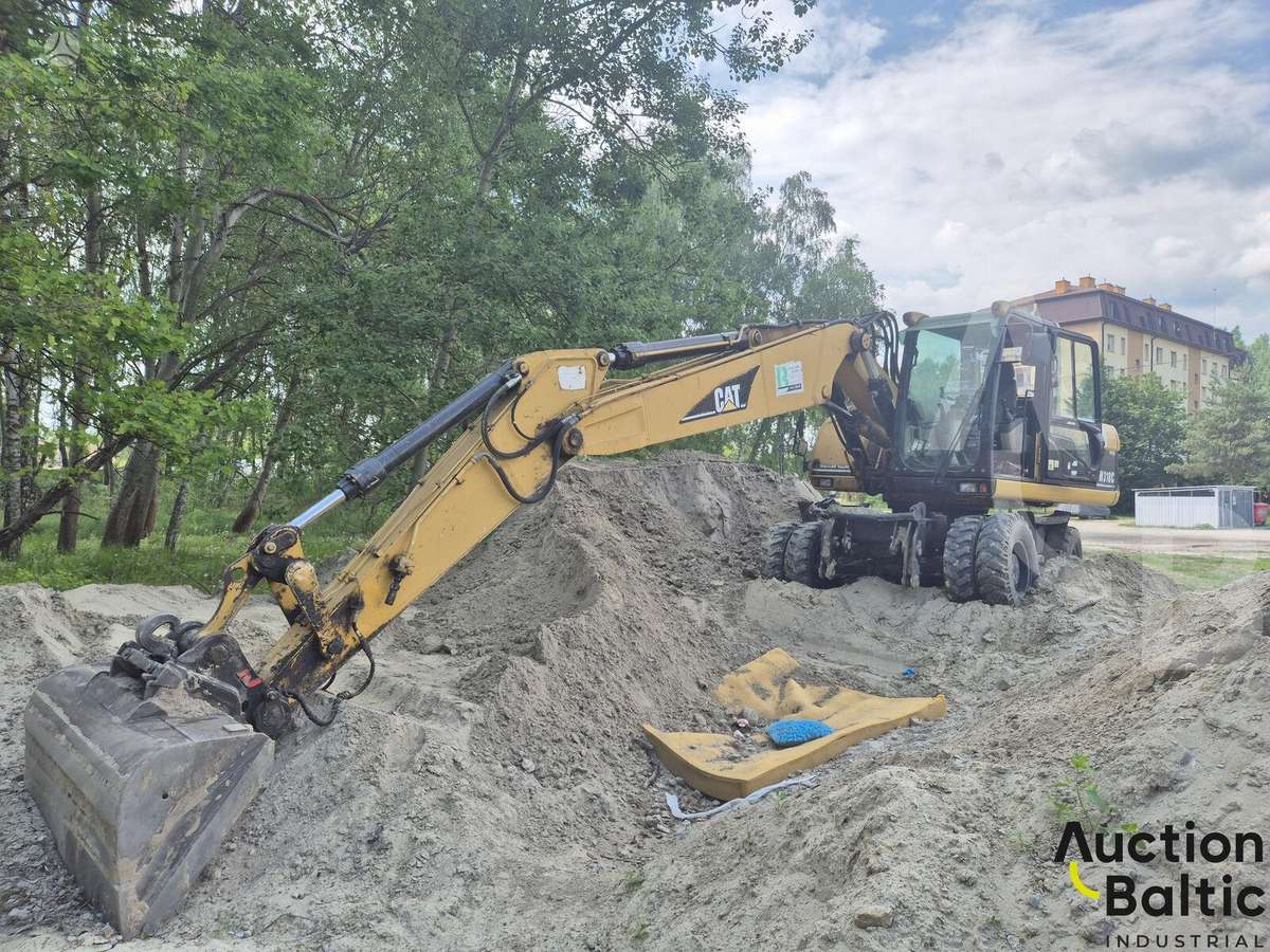 Caterpillar M 318 C, экскаваторы