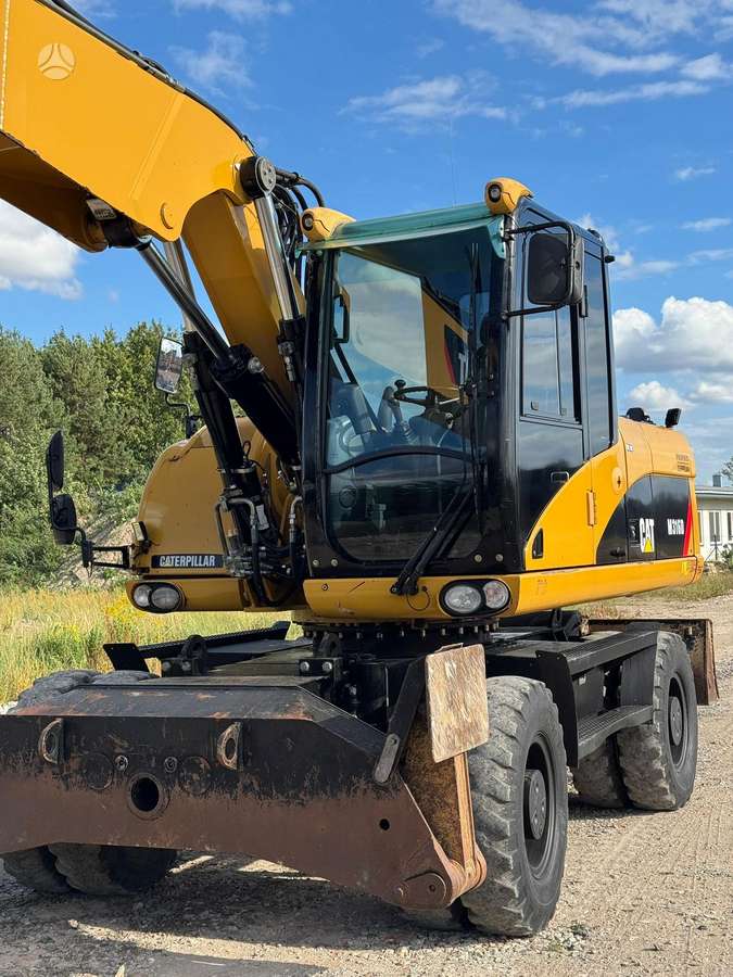 Caterpillar M316D, ekskavatoriai