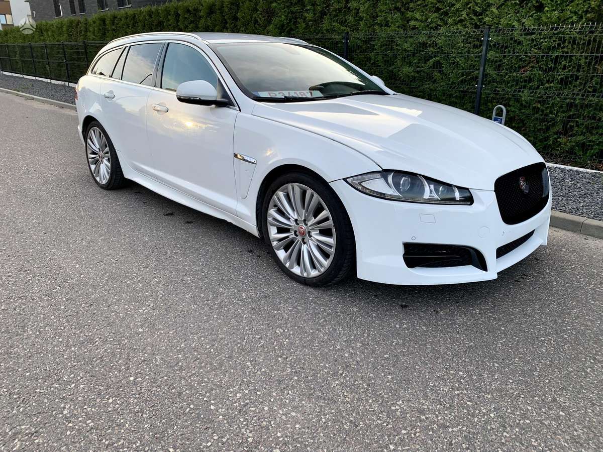Jaguar XF 2014 — фото 12