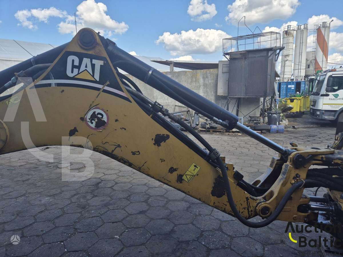 Caterpillar 428 E, экскаваторные погрузчики