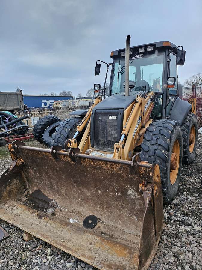 Case 695SR2-4PS, excavator loader
