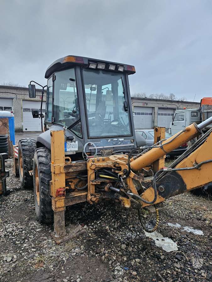 Case 695SR2-4PS, excavator loader