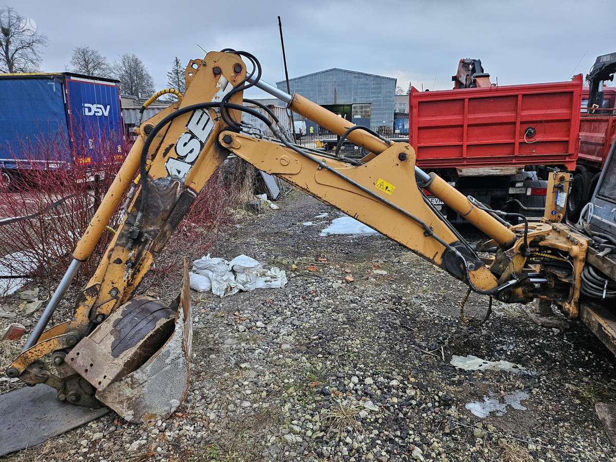 Case 695SR2-4PS, excavator loader
