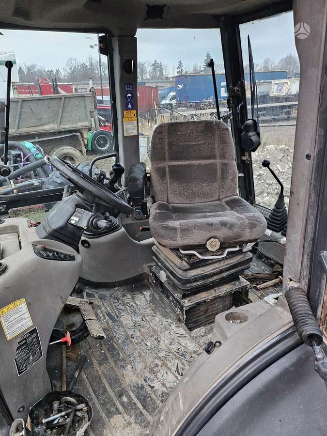 Case 695SR2-4PS, excavator loader