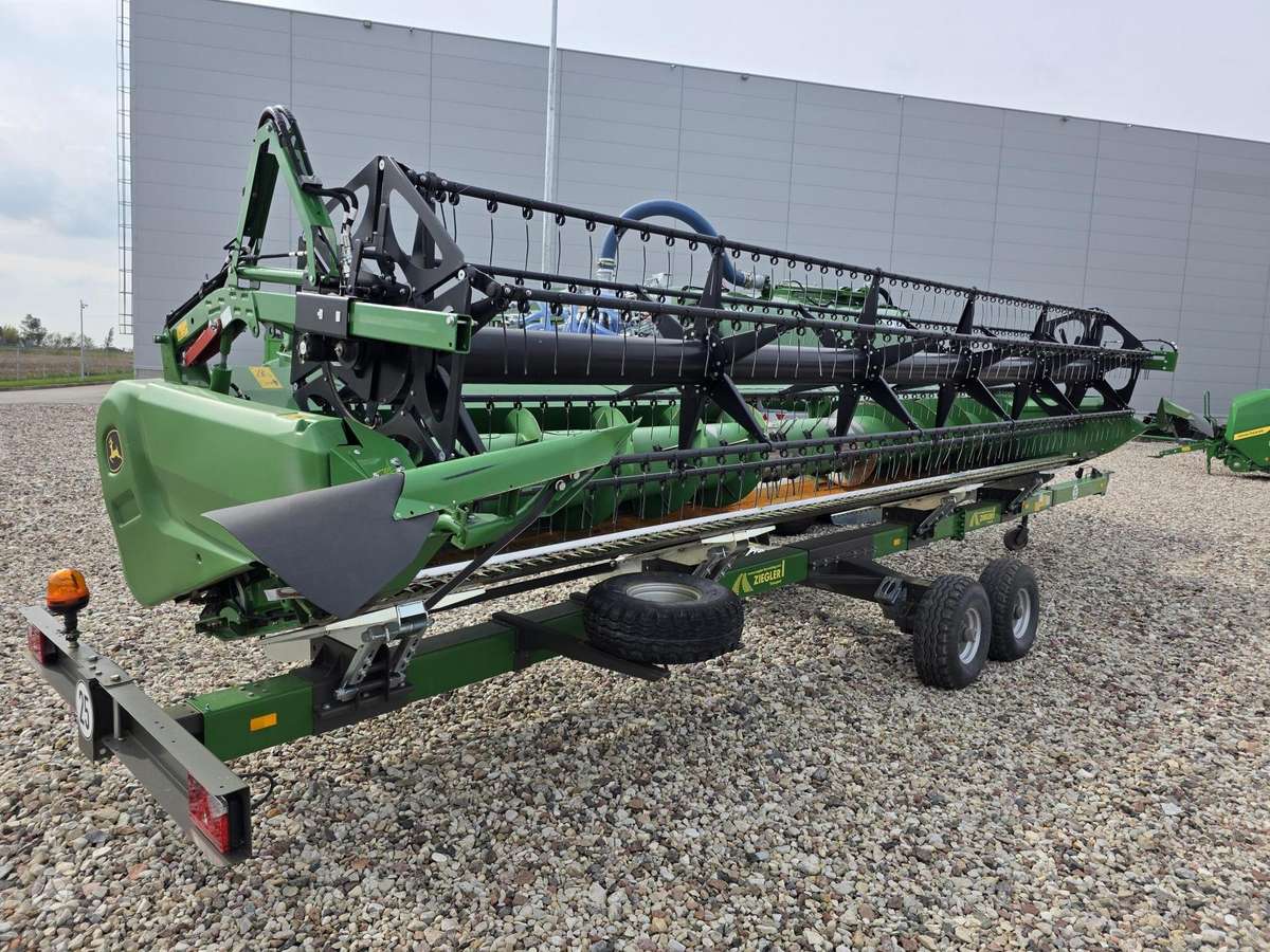 John Deere T670, kombainai