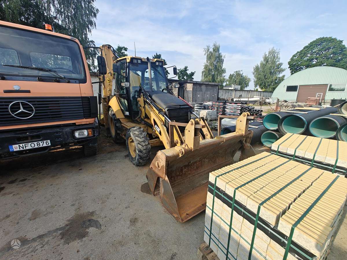 Caterpillar 428E, excavator loader