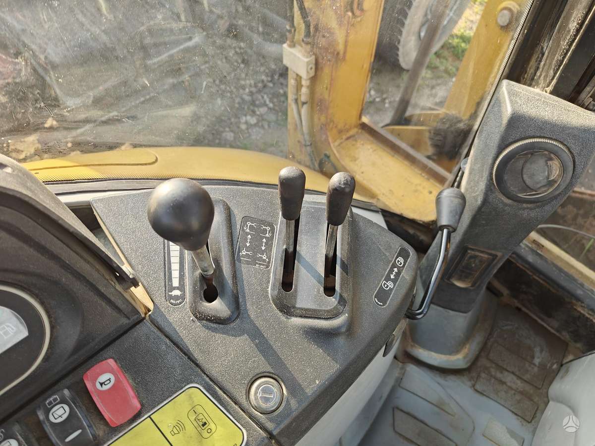 Caterpillar 428E, excavator loader