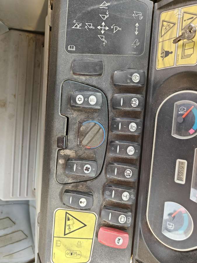 Caterpillar 428E, excavator loader
