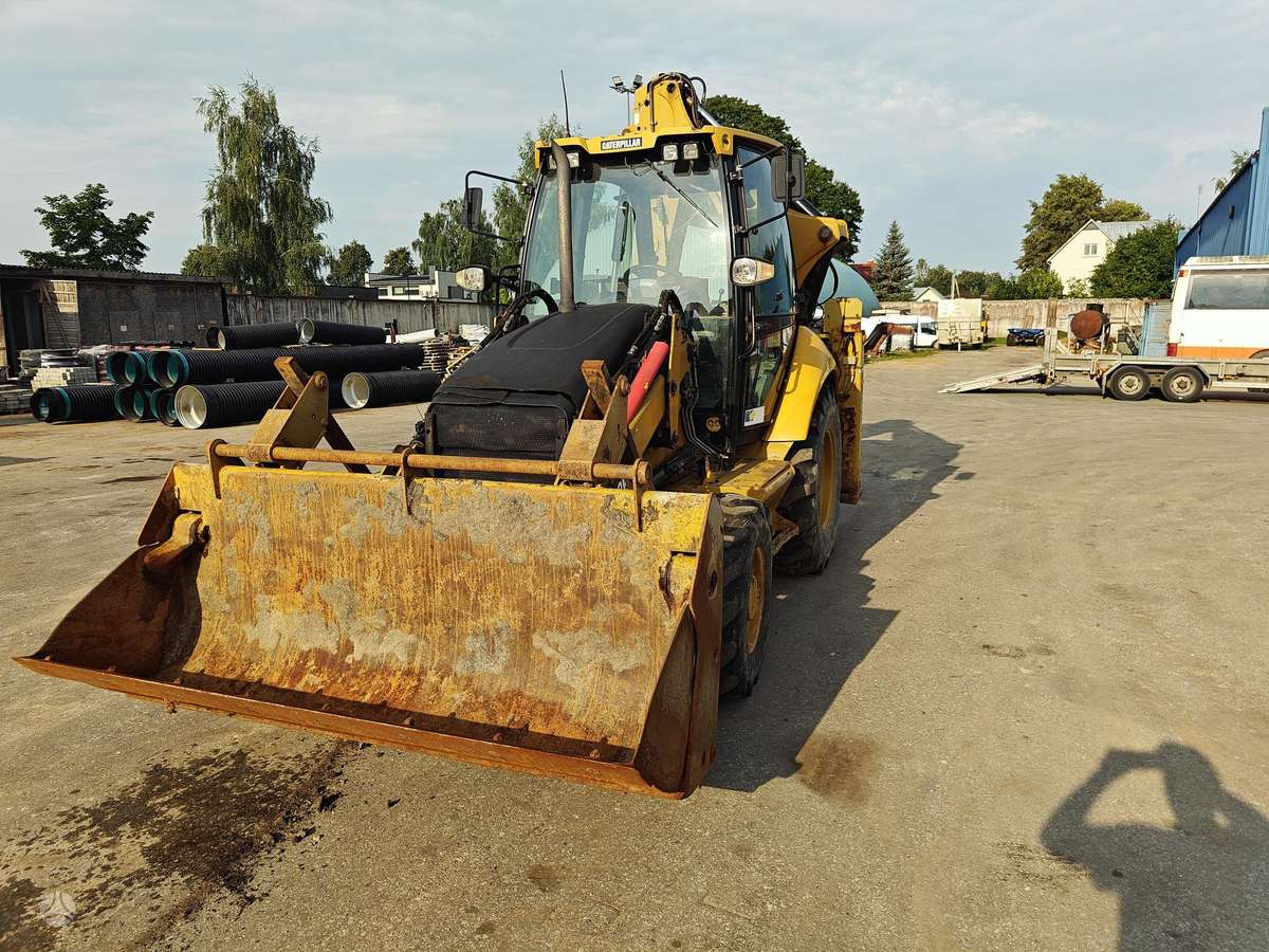 Caterpillar 428E, excavator loader