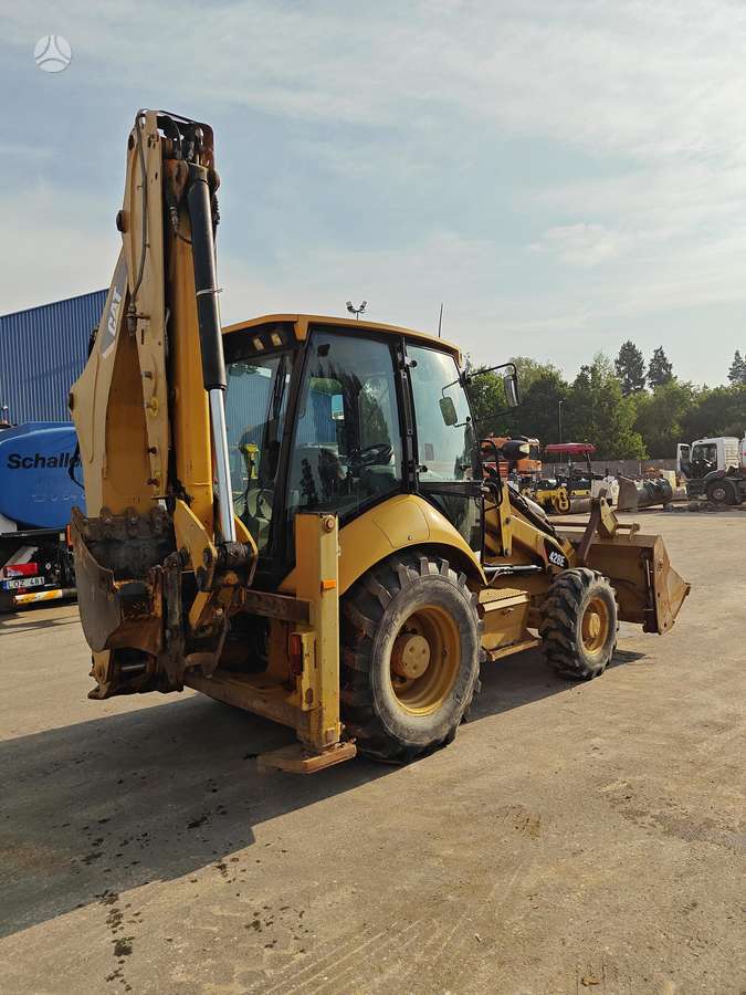 Caterpillar 428E, excavator loader
