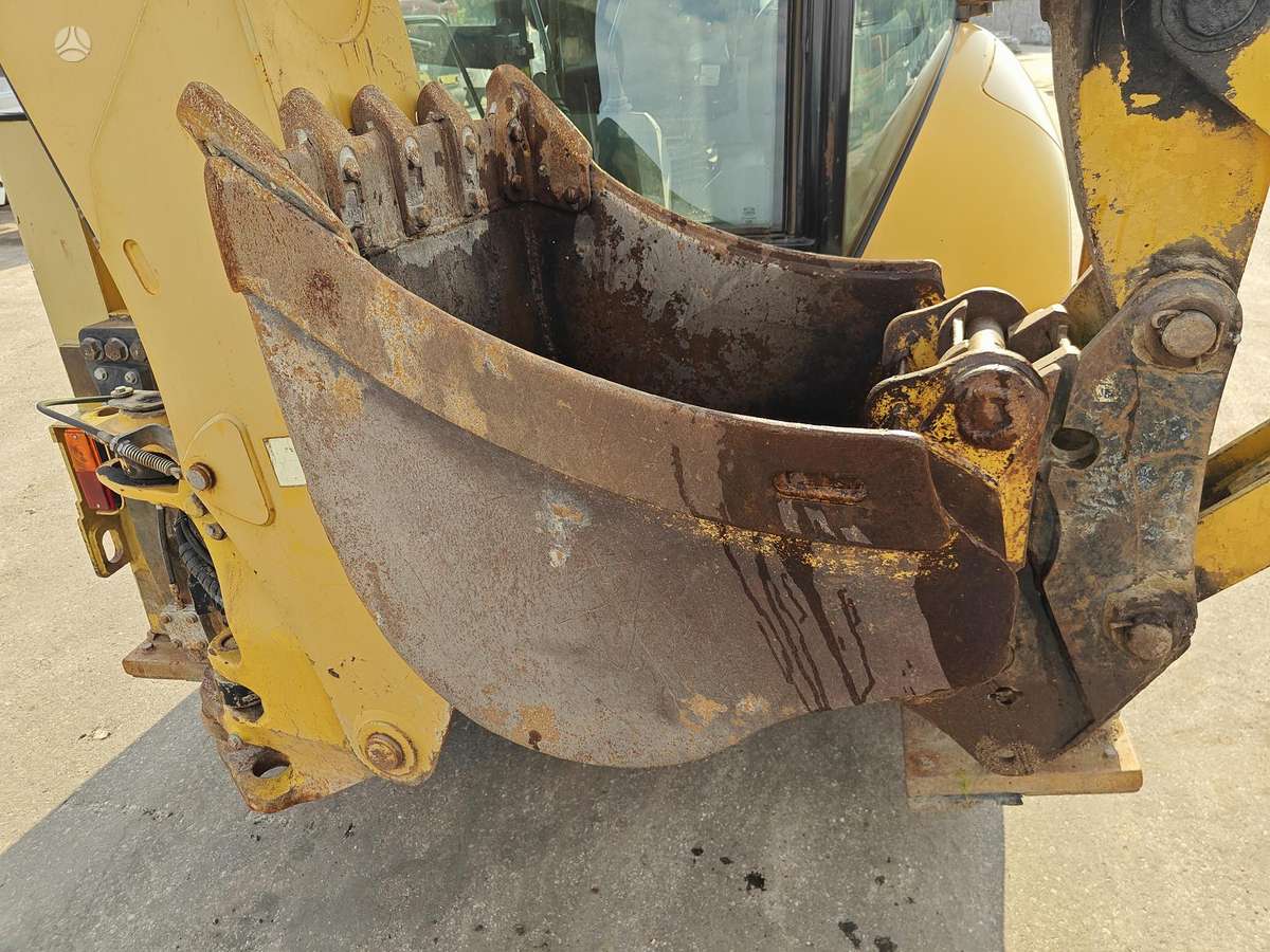 Caterpillar 428E, excavator loader