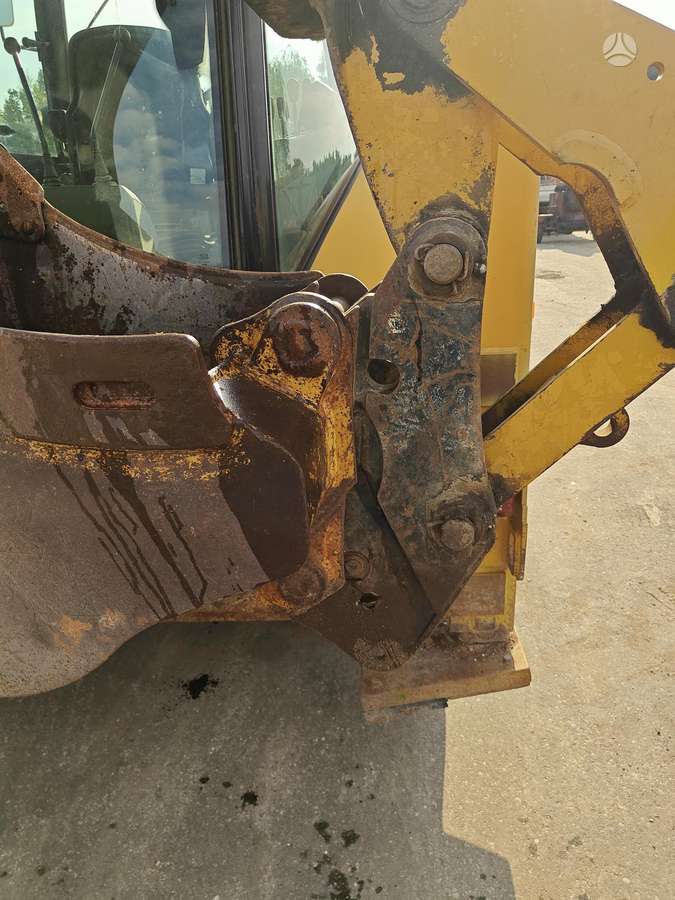 Caterpillar 428E, excavator loader
