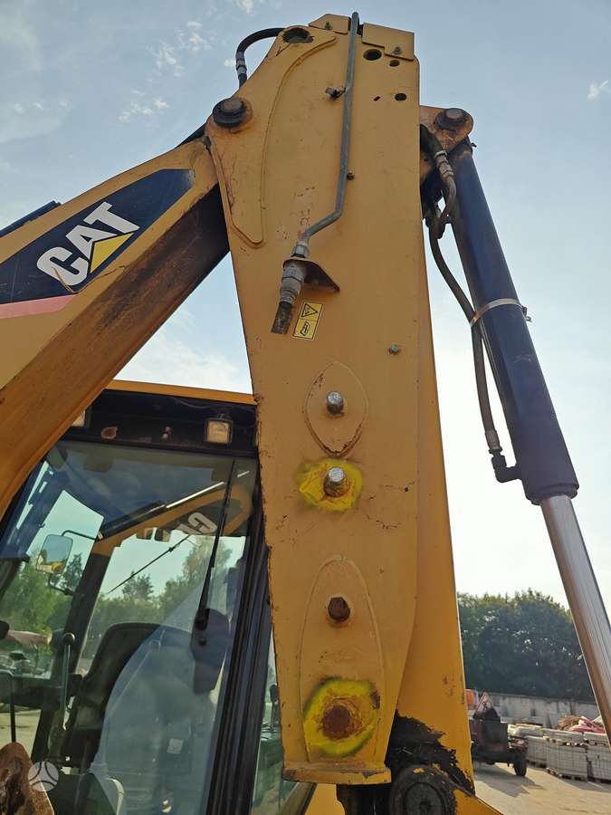 Caterpillar 428E, excavator loader