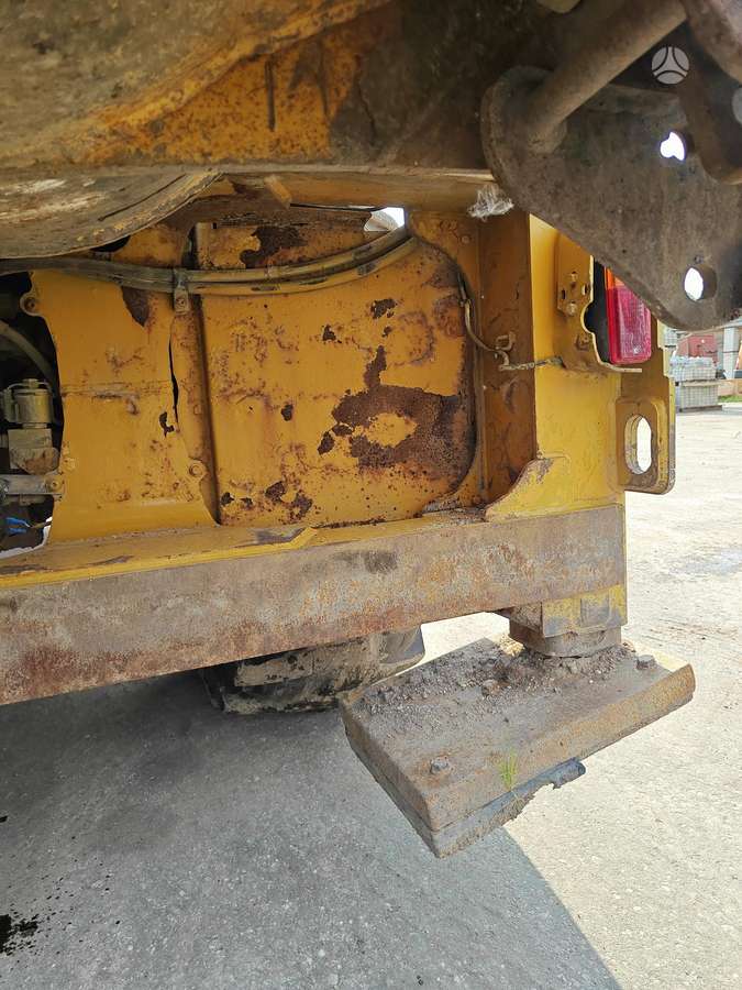 Caterpillar 428E, excavator loader