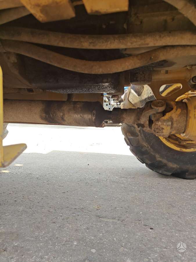 Caterpillar 428E, экскаваторные погрузчики