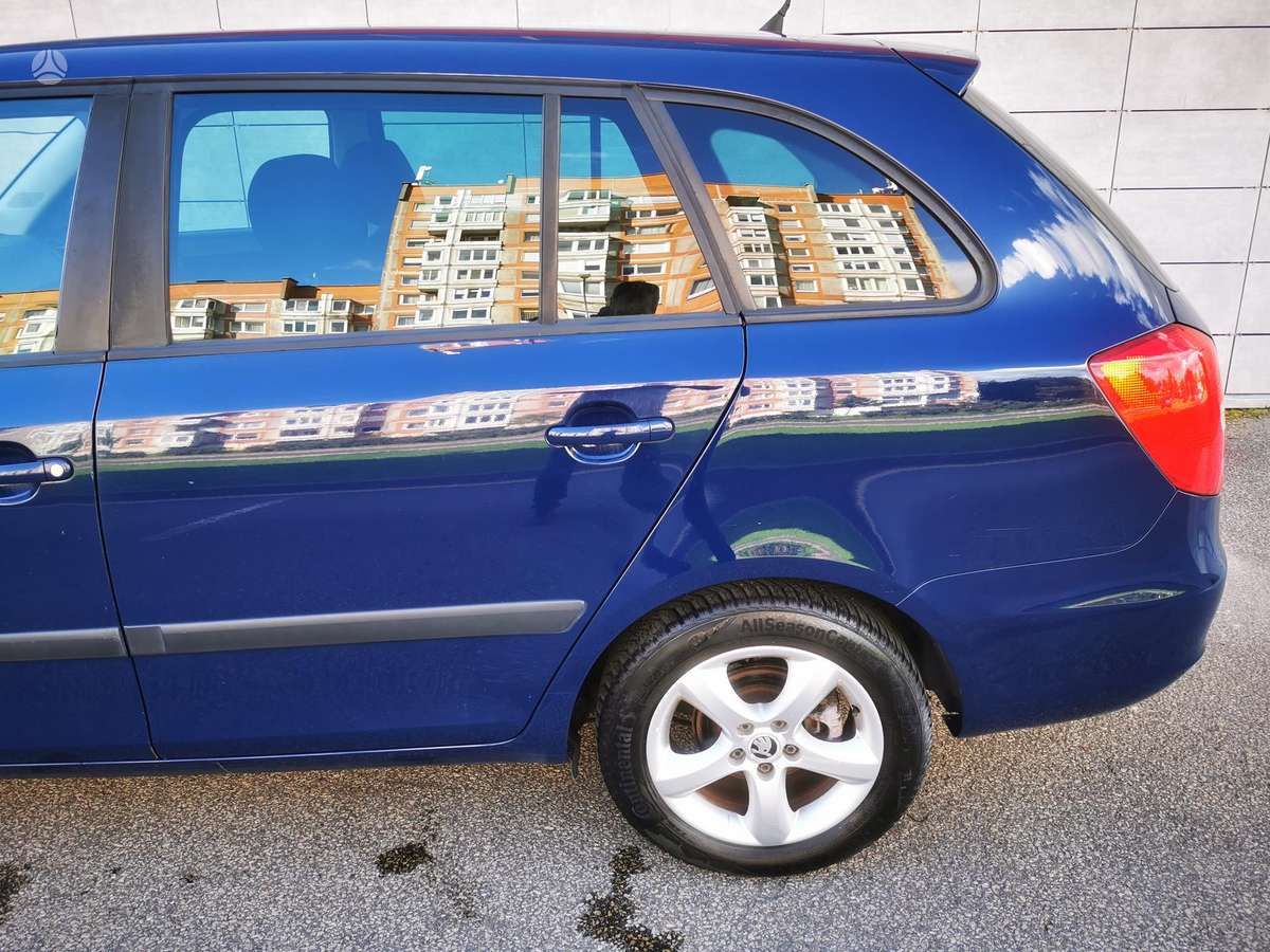 Skoda Fabia 2013 — фото 14
